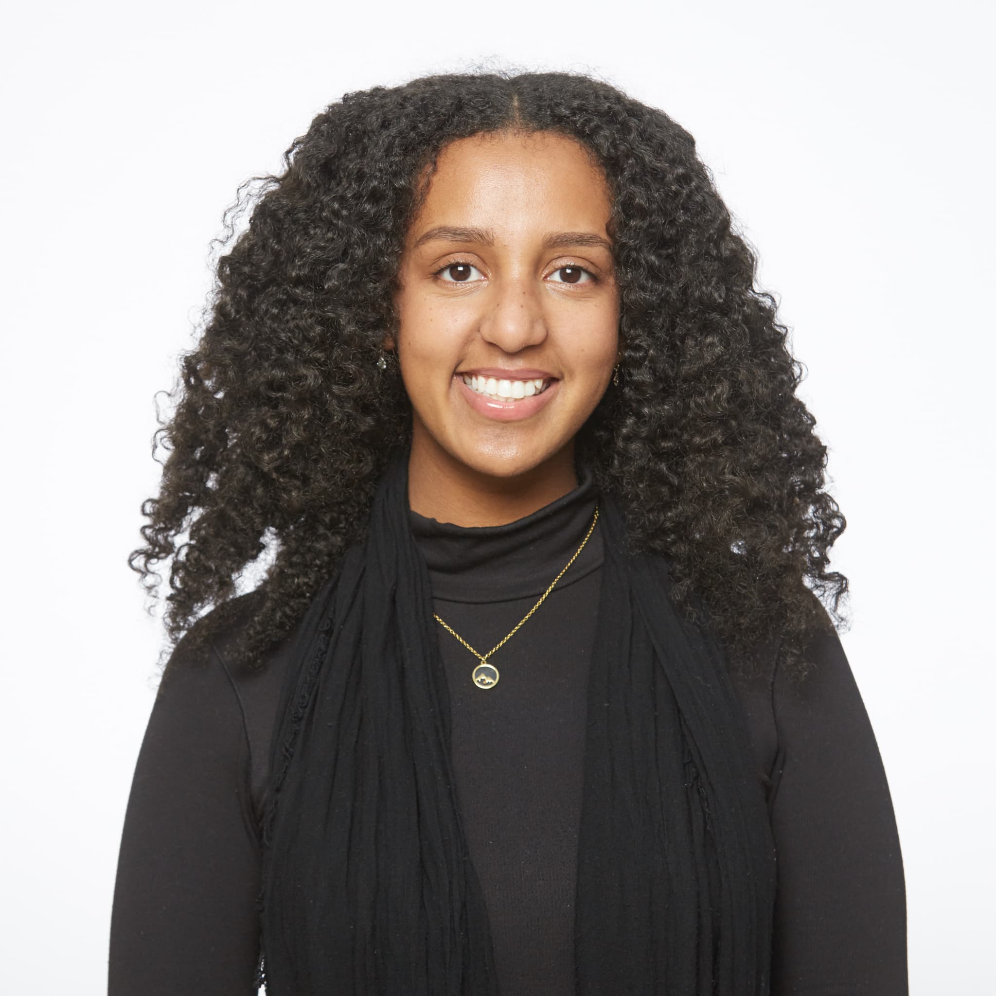 Professional portrait of Hilina, a psychotherapist and counsellor, smiling warmly